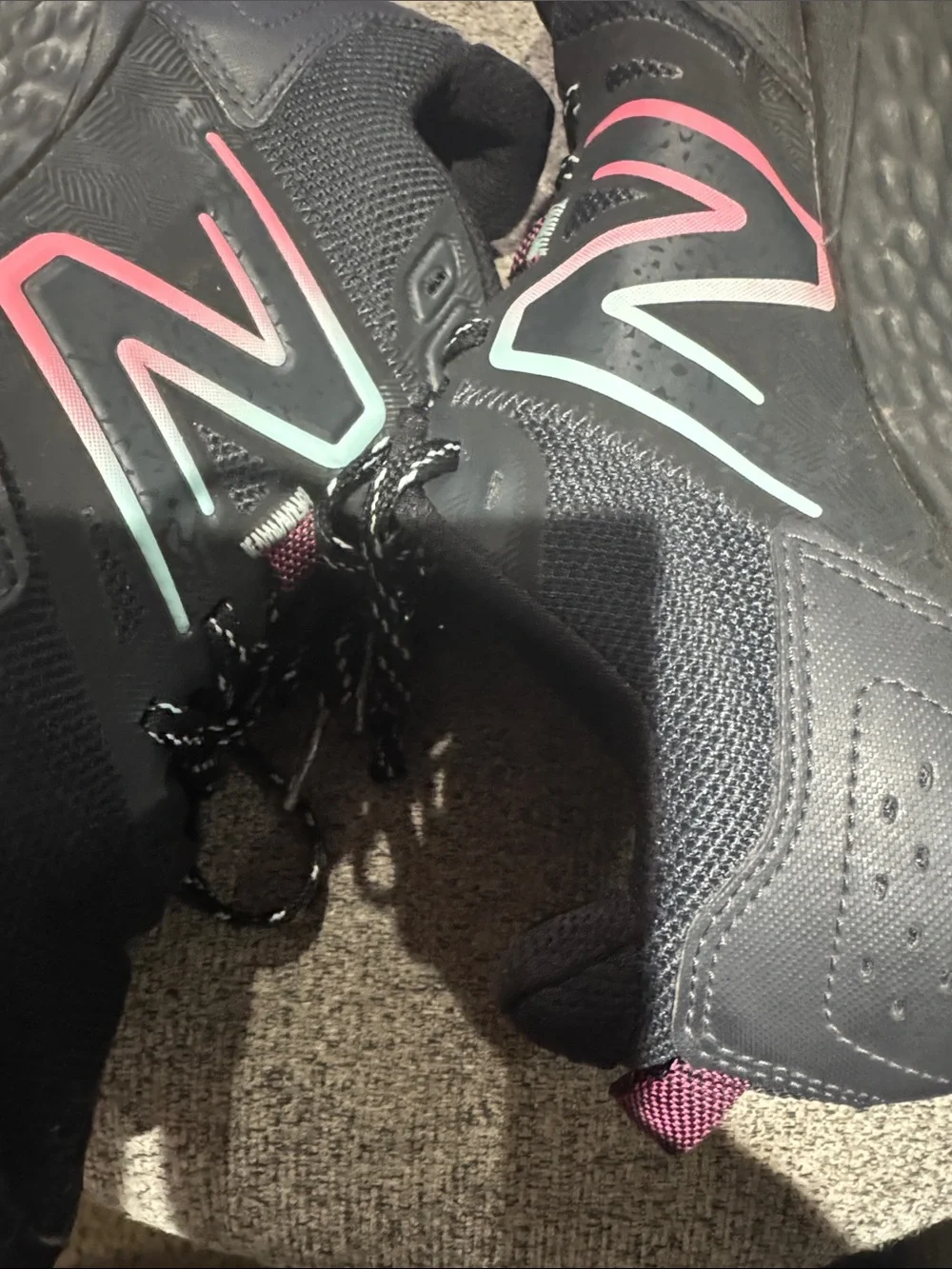 New Balance Women’s Black Athletic Sneakers with Pink and Teal Accents